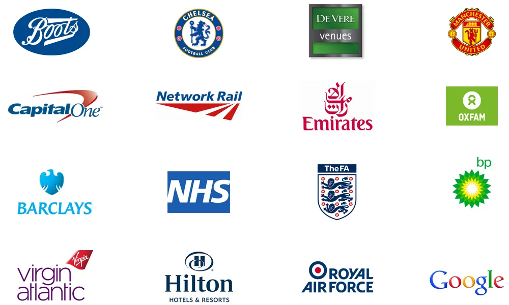 Grid of sixteen corporate logos including Boots, Chelsea Football Club, De Vere venues, Manchester United, Capital One, Network Rail, Emirates, Oxfam, Barclays, NHS, The FA, BP, Virgin Atlantic, Hilton Hotels & Resorts, Royal Air Force, and Google.